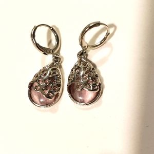 New, dangle silver earrings.